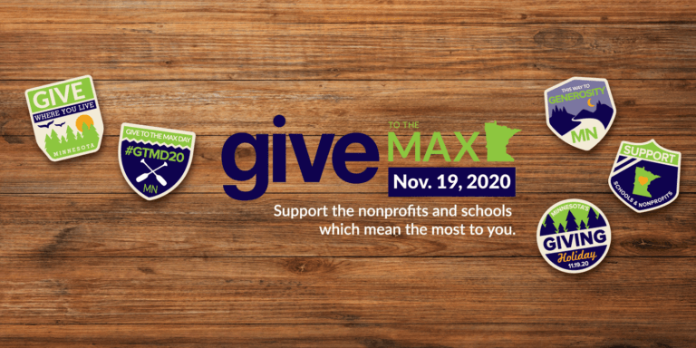 Give to the Max Day logo on wooden background