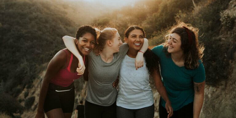 group of friends hiking outdoors