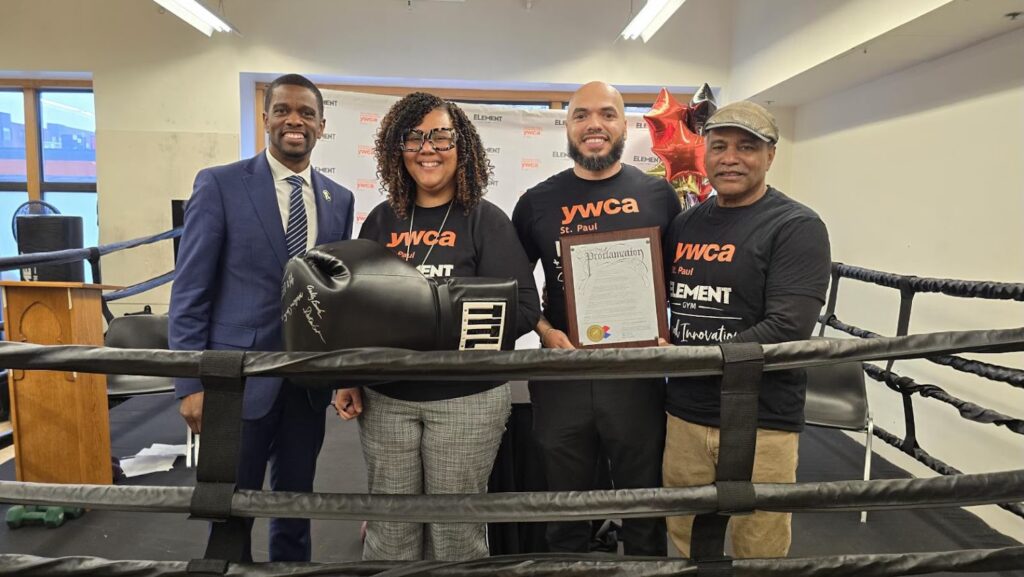 Left to right - St. Paul Mayor Melvin Carter, YWCA St. Paul CEO Ashley Booker, Element Gym owner Dalton Outlaw, and Mayor Carter's father, Melvin Carter, Jr.